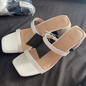 Never worn white heels